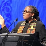 Rev. Kimberly Quinn Johnson preaches from the pulpit at General Assembly